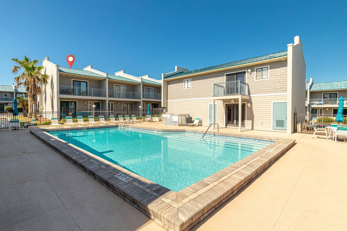 Shared pool and townhomes at Gulf Winds